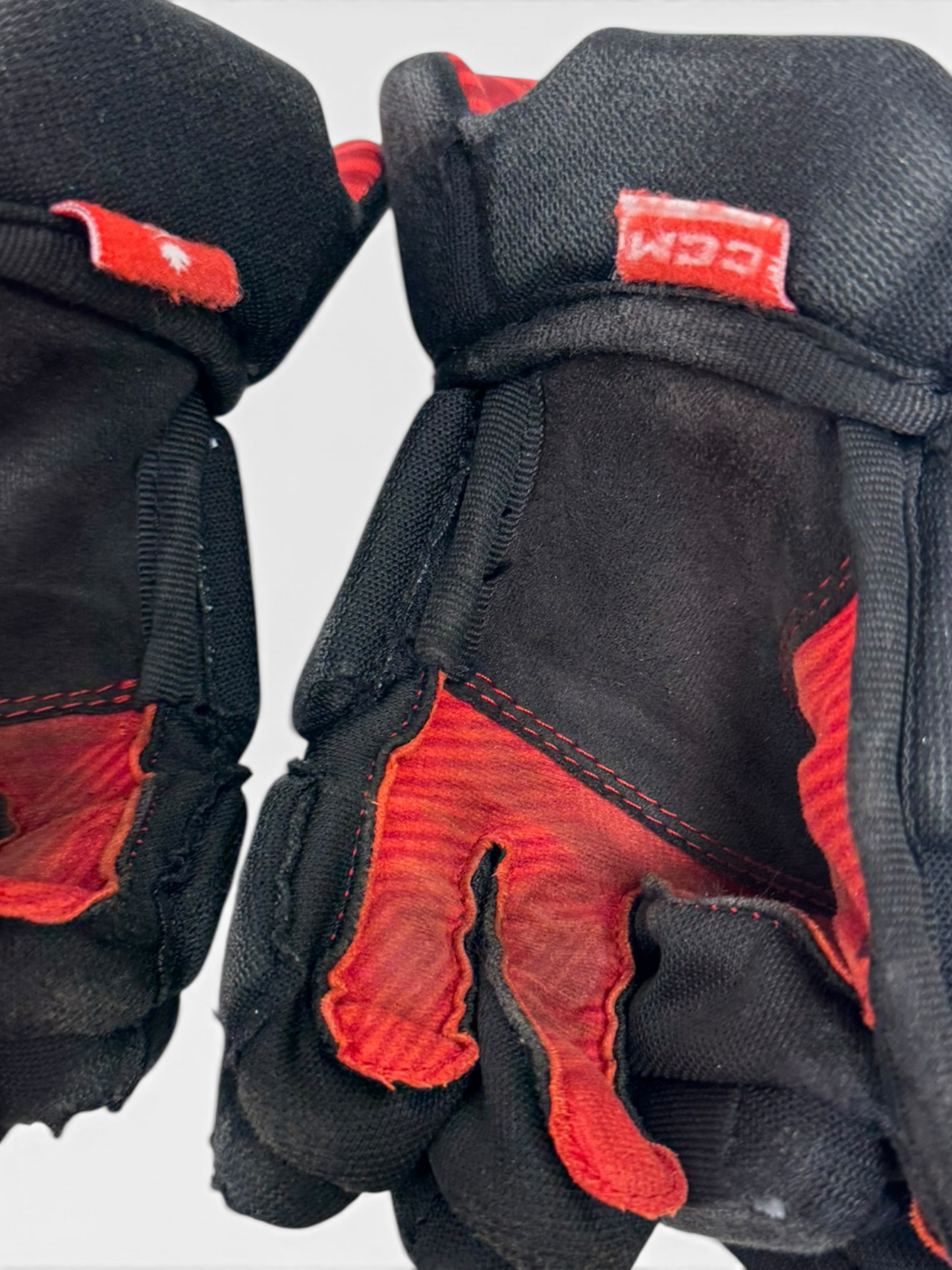 CCM NEXT Junior Ice Hockey Gloves – 10” – Black/Red – Used